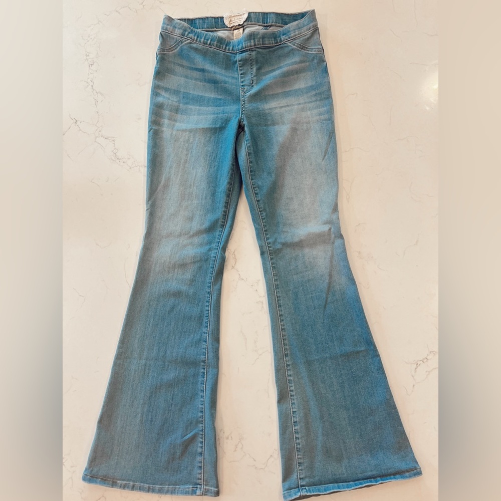 Women’s bell-bottom blue jeans